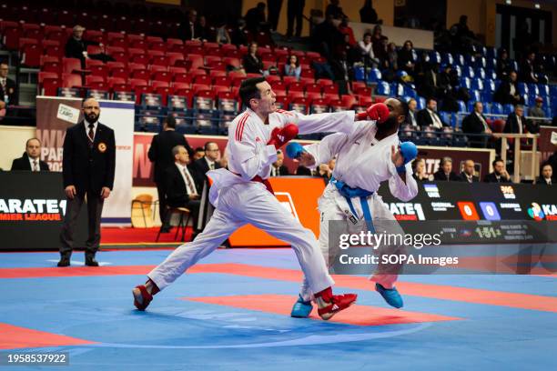 Thomas Scott , from United States of America, and Kilian Cizo from France compete during the Male Kumite 75kg category. The Paris Open Karaté 2024,...