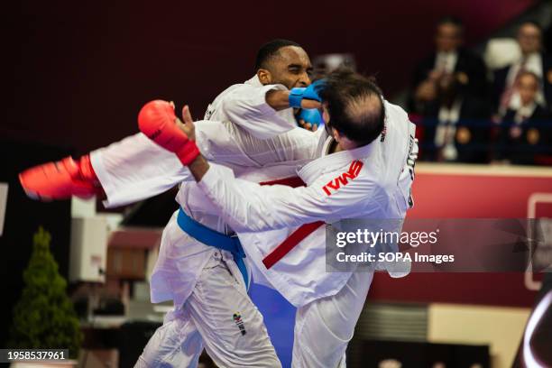 Bahman Asgari Ghoncheh from Iran and Kilian Cizo from France compete during the Male Kumite 75kg category. The Paris Open Karaté 2024, organized by...