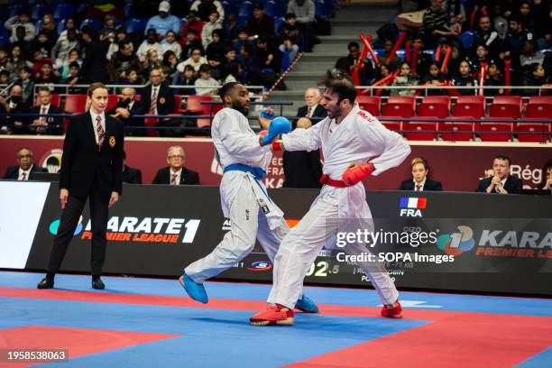 Bahman Asgari Ghoncheh from Iran and Kilian Cizo from France compete during the Male Kumite 75kg category. The Paris Open Karaté 2024, organized by...