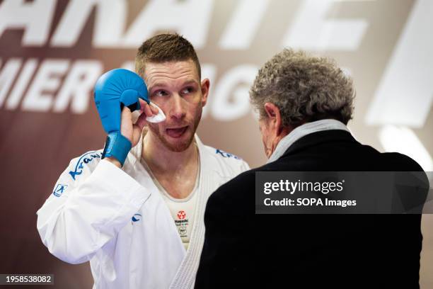 Michael Dasoul from Belgium, being assisted by medic during the Male Kumite 60kg category. The Paris Open Karaté 2024, organized by World Karaté...