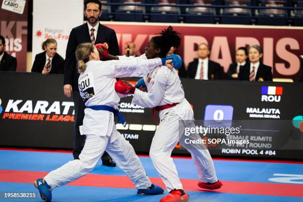 Miruna Mihaela Malauta from Romania and Fatima Zahra Chajai from Morocco compete during the Kumite 61kg category. The Paris Open Karaté 2024,...