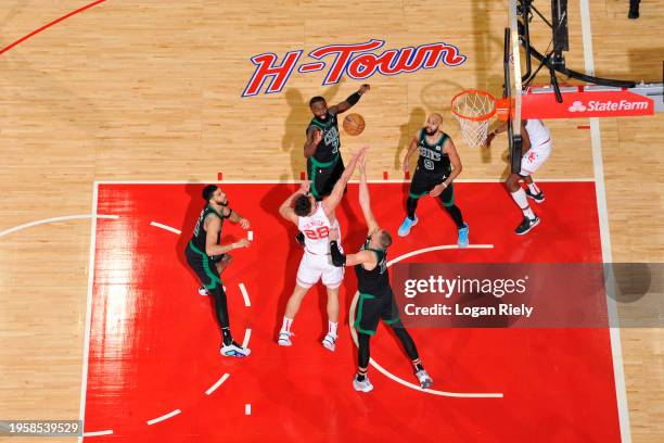 Alperen Sengun of the Houston Rockets shoots the ball during the game against the Boston Celtics on January 21, 2024 at the Toyota Center in Houston,...