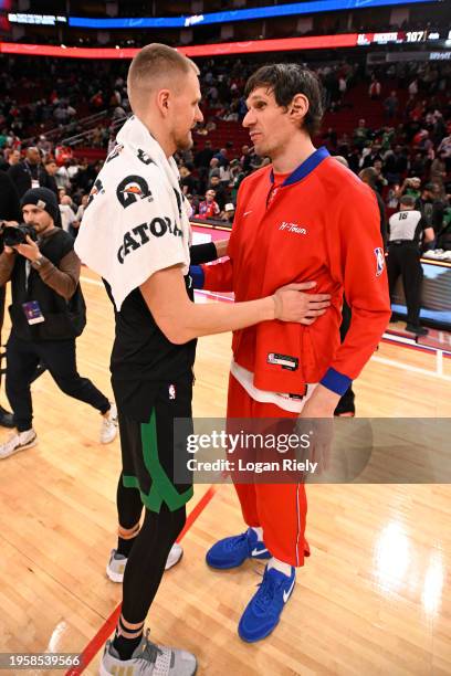 Kristaps Porzingis of the Boston Celtics and Boban Marjanovic of the Houston Rockets embrace after the game on January 21, 2024 at the Toyota Center...