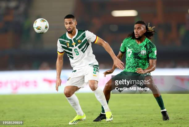 Frank Magri of Cameroon competes for the ball with Alex Iwobi of Nigeria ,during the Total Energies CAF Africa Cup of Nations round of 16 match...