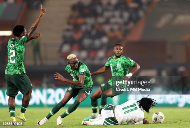 Victor Osimhen of Nigeria competes for the ball with Georges-Kévin N'Koudou of Cameroon ,during the Total Energies CAF Africa Cup of Nations round of...