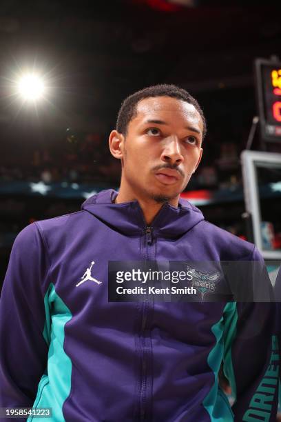 Nick Smith Jr. #8 of the Charlotte Hornets stands for the National Anthem before the game against the Utah Jazz on January 27, 2024 at Spectrum...