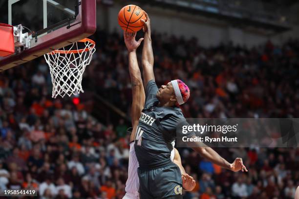 Kowacie Reeves Jr. #14 of the Georgia Tech Yellow Jackets goes up for a dunk against the Virginia Tech Hokies in the first half during a game at...