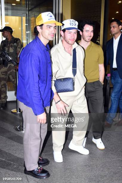 Joe Jonas, Nick Jonas and Kevin Jonas are seen arriving at Mumbai International Airport on January 26, 2024 in Mumbai, India.