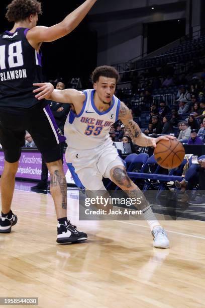 Caleb McConnell of the Oklahoma City Blue dribbles the ball against the Stockton Kings during the game on January 27, 2024 at Stockton Arena in...