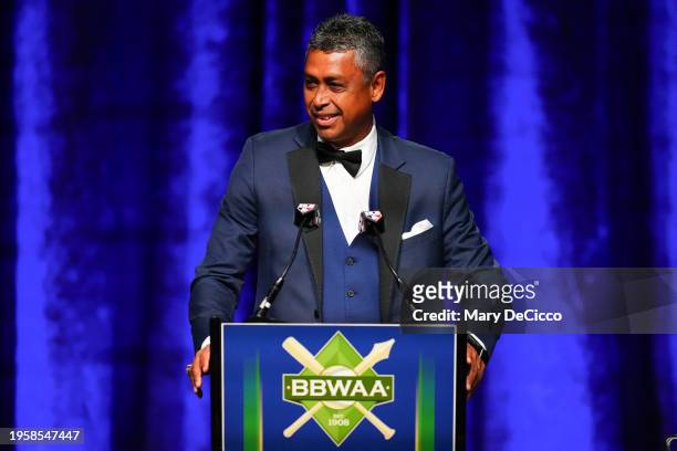 Former MLB player Ramiro Mendoza speaks to the crowd after accepting the Casey Stengel, "You Can Look It Up" award poses for a portrait at New York...
