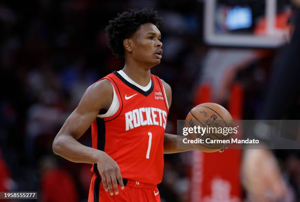 Amen Thompson of the Houston Rockets in action against the Detroit Pistons at Toyota Center on January 01, 2024 in Houston, Texas.