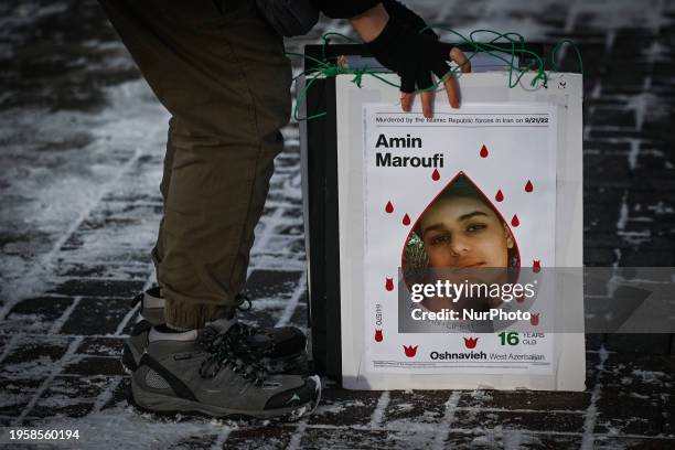 Members of the Iranian diaspora and activists gather in Dr. Wilbert McIntyre Park during the 'United Against Executions in Iran' protest, condemning...