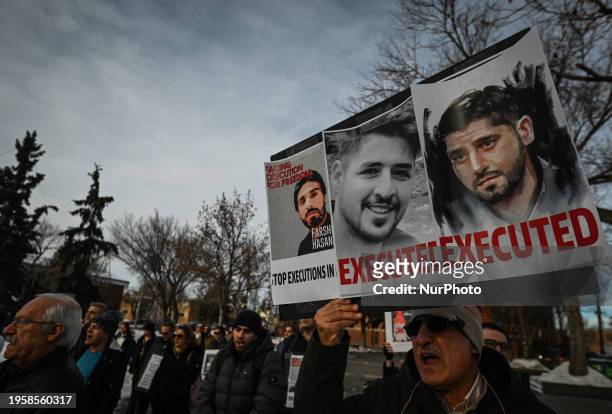 Members of the Iranian diaspora and activists gather in Dr. Wilbert McIntyre Park during the 'United Against Executions in Iran' protest, condemning...