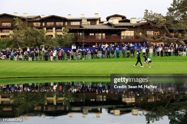 Xander Schauffele of the United States walks on the 18th hole during the first round of the Farmers Insurance Open on the Torrey Pines South Course...