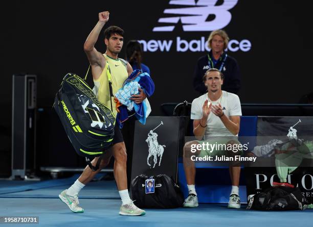 Carlos Alcaraz of Spain walks off court after losing their quarterfinals singles match against Alexander Zverev of Germany during the 2024 Australian...