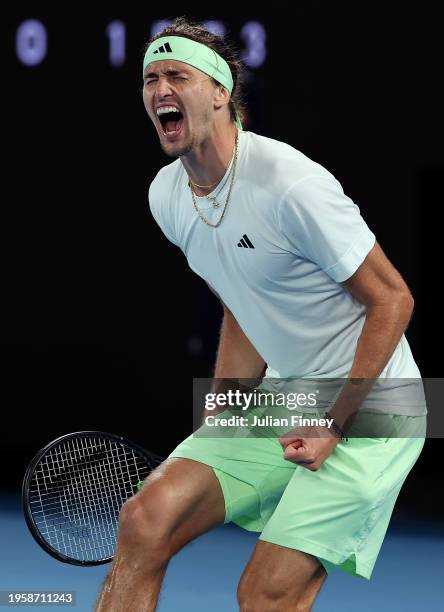 Alexander Zverev of Germany celebrates his win after their quarterfinals singles match against Carlos Alcaraz of Spain during the 2024 Australian...