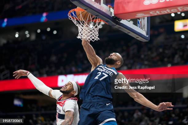 Rudy Gobert of the Minnesota Timberwolves dunks against Daniel Gafford of the Washington Wizards during the first half at Capital One Arena on...