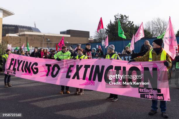 Climate activists march to protest against private jet flights and the proposed expansion of Farnborough Airport on 27th January 2024 in Farnborough,...