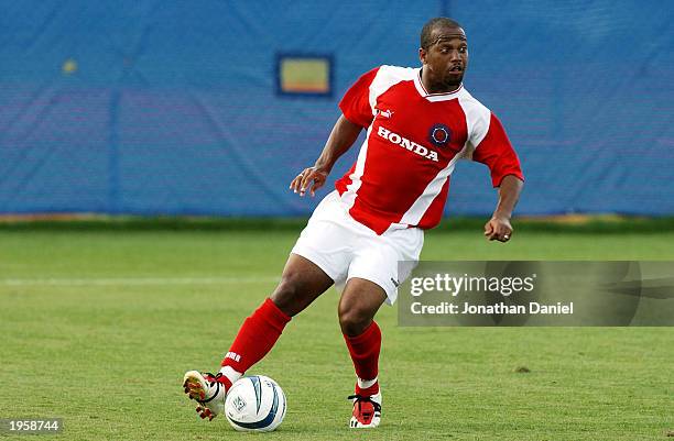 Midfielder Andy Williams of the Chicago Fire dribbles the ball during the MLS exhibition game against the D.C. United at Florida Atlantic University...