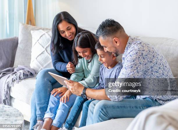 Family Using Digital Technology 20 741 Digital Technology Family Stock Photos, High-Res Pictures, and ...