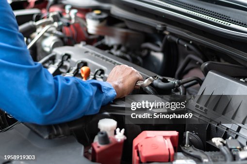 Expert technicians perform precise engine maintenance. Expert technicians perform precise engine maintenance.