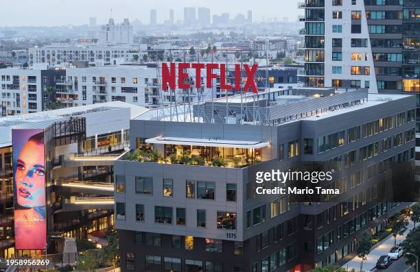 In an aerial view, the Netflix logo is displayed above its corporate offices on January 24, 2024 in Los Angeles, California. Netflix shares jumped...