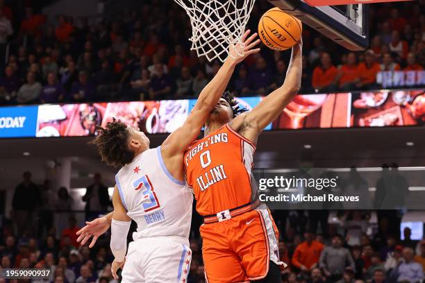 Ty Berry of the Northwestern Wildcats commits a flagrant foul on Terrence Shannon Jr. #0 of the Illinois Fighting Illini as he goes up for a dunk...