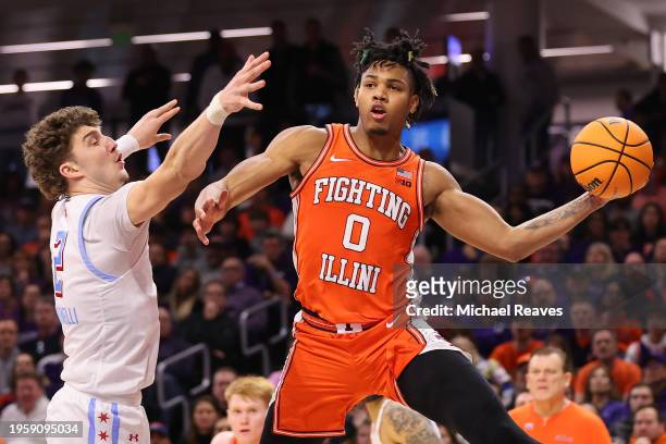 Terrence Shannon Jr. #0 of the Illinois Fighting Illini passes around Nick Martinelli of the Northwestern Wildcats during the second half at...