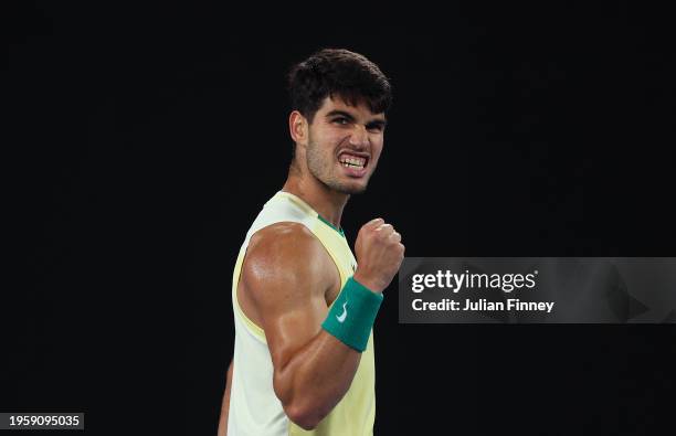 Carlos Alcaraz of Spain celebrates during their quarterfinals singles match against Alexander Zverev of Germany during the 2024 Australian Open at...