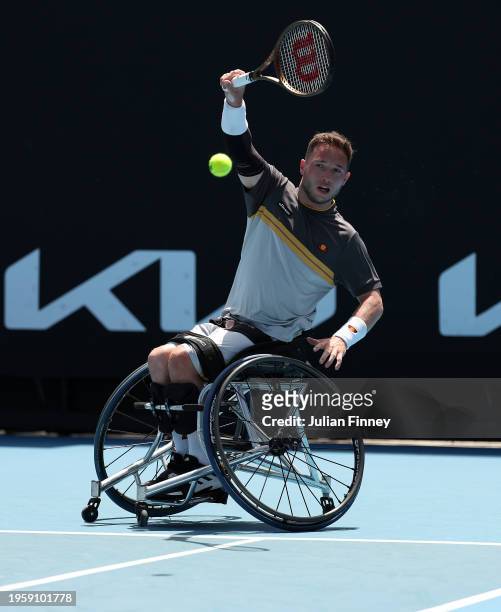 Alfie Hewett of the United Kingdom plays a forehand in their quarterfinals wheelchair singles match against Alexander Cataldo of Chile during the...