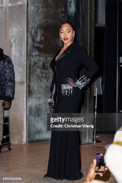 Jordyn Woods wears black dress outside Zuhair Murad during the Haute Couture Spring/Summer 2024 as part of Paris Fashion Week on January 24, 2024 in...