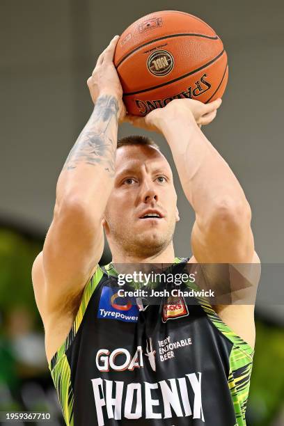 Mitchell Creek of the Phoenix warms up prior to the round 17 NBL match between South East Melbourne Phoenix and Sydney Kings at State Basketball...