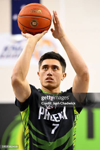 Reuben Te Rangi of the Phoenix warms up prior to the round 17 NBL match between South East Melbourne Phoenix and Sydney Kings at State Basketball...