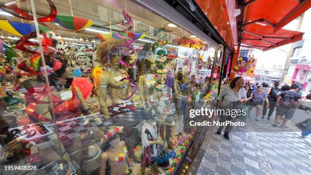 Consumers are bustling in the 25 de Marco area in Sao Paulo, Brazil, on January 27 as Carnival is just around the corner. On the eve of the street...
