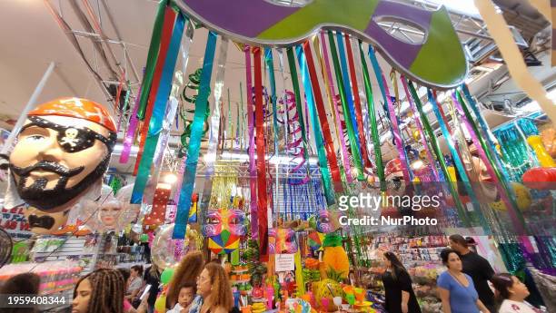 Consumers are bustling in the 25 de Marco area in Sao Paulo, Brazil, on January 27 as Carnival is just around the corner. On the eve of the street...