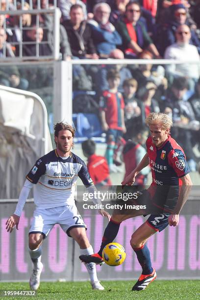 Antonino Gallo of Lecce and Morten Thorsby of Genoa vie for the ball during the Serie A TIM match between Genoa CFC and US Lecce - Serie A TIM at...