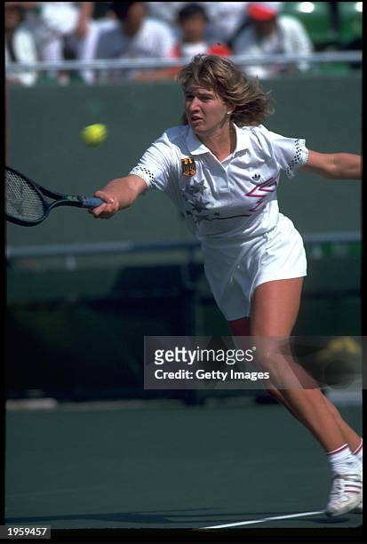 Steffi Graf of Germany competes against Gabriela Sabatini in the Women's Singles Tennis event at the 1988 Seoul Summer Olympic Games on October 1,...