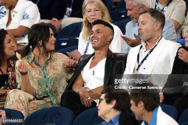 Anthony Callea and Tim Campbell look on at Rod Laver Arena ahead of the Semi Final singles match between Coco Gauff of the United States and Aryna...