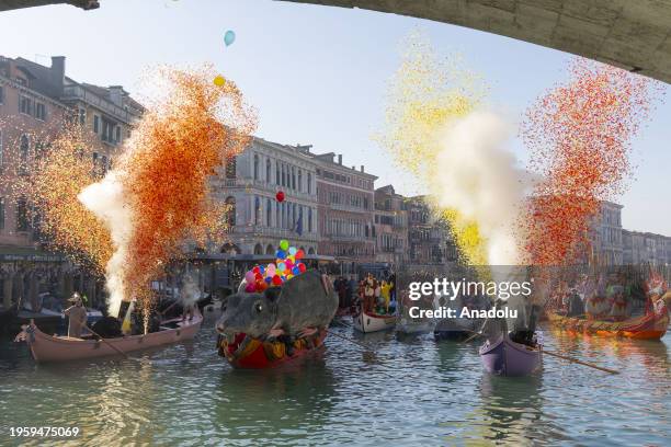 Boat carrying a large mouse made of paper-mache called 'Pantegana' passes during the carnival regatta in the Grand Canal of Venice, Italy on January...