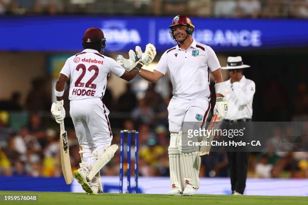 Joshua Da Silva of the West Indies celebrates 50 runs during day one of the Second Test match in the series between Australia and West Indies at The...