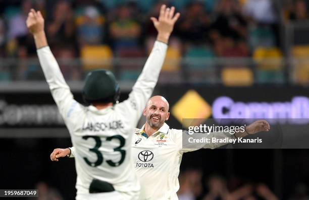 Nathan Lyon of Australia celebrates taking the wicket of Joshua Da Silva of the West Indies during day one of the Second Test match in the series...