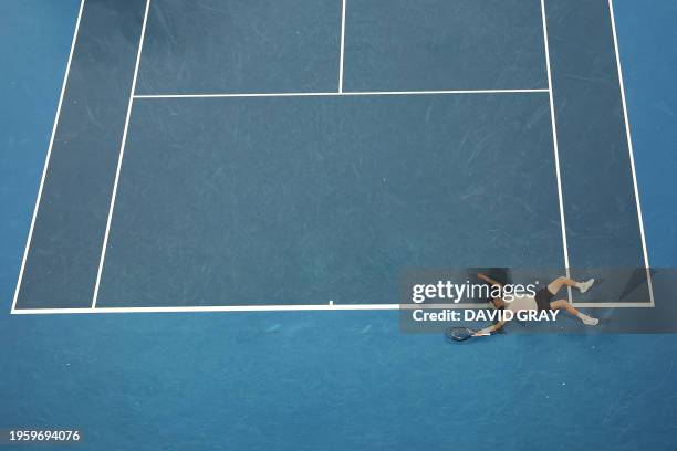 Italy's Jannik Sinner celebrates match point against Russia's Daniil Medvedev during their men's singles final match on day 15 of the Australian Open...
