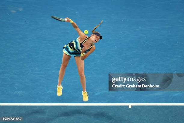 Dayana Yastremska of Ukraine serves in their Semi Final singles match against Qinwen Zheng of China during the 2024 Australian Open at Melbourne Park...