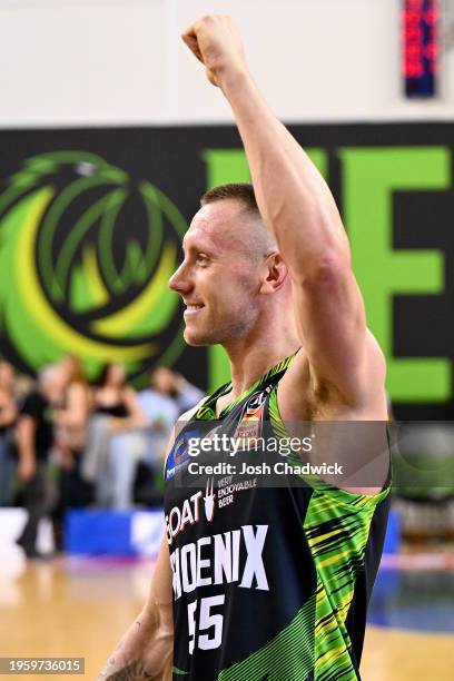 Mitchell Creek of the Phoenix celebrates winning the round 17 NBL match between South East Melbourne Phoenix and Sydney Kings at State Basketball...