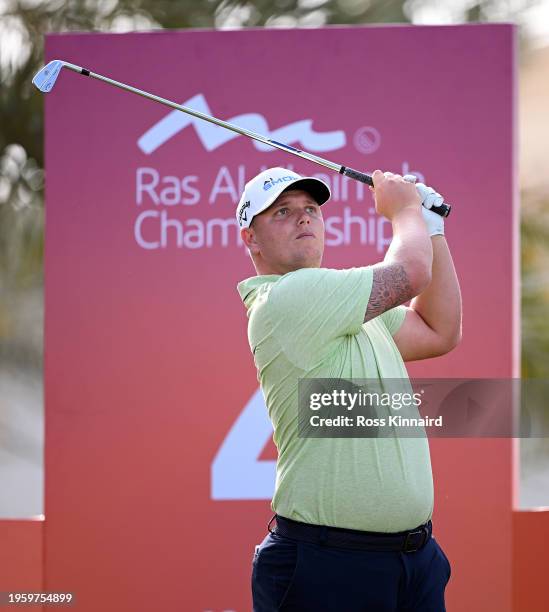 Callum Shinkwin of England tees off on the fourth hole on Day One of the Ras Al Khaimah Championship at Al Hamra Golf Club on January 25, 2024 in Ras...