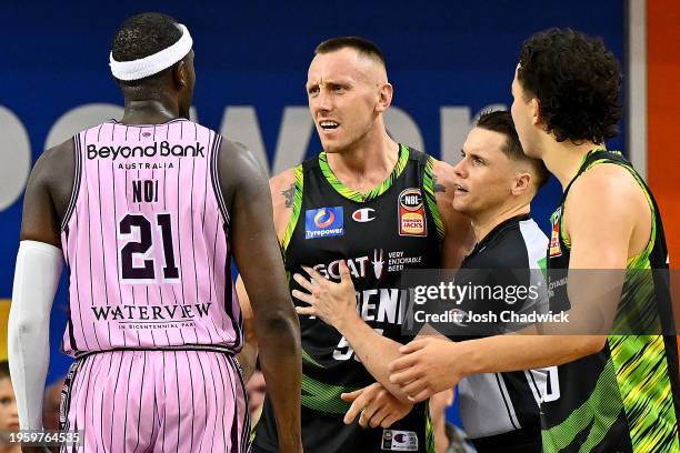 Mitchell Creek of the Phoenix and Kouat Noi of the Kings exchange words during the round 17 NBL match between South East Melbourne Phoenix and Sydney...