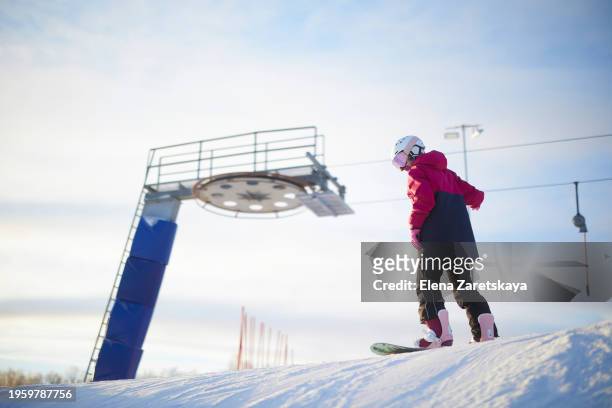snowboarding. snowboarder close-up - snowboard jump close up stock pictures, royalty-free photos & images