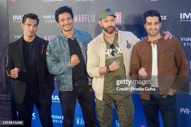 Karan Singh Grover, Guest, Hrithik Roshan and Akshay Oberoi attend the screening of film 'Fighter' on January 25, 2024 in Mumbai, India.