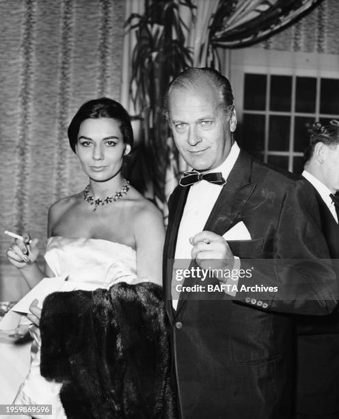 Curt Jurgens with wife Simone Bicheron, at the British Film Academy Awards, 18 March 1959, held at The Savoy, London