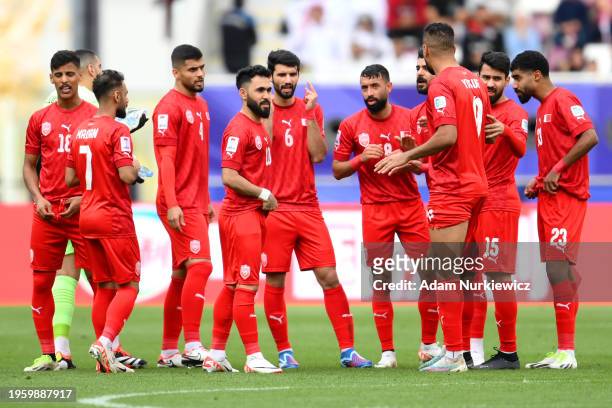 Players of Bahrain form a huddle during the AFC Asian Cup Group E match between Jordan and Bahrain at Khalifa International Stadium on January 25,...
